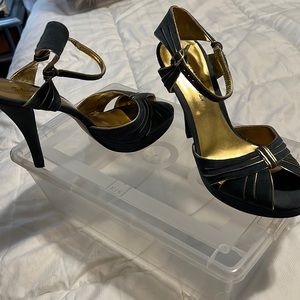 Gabrielle Rocha blue suede sandals wirh gold detailing throughout sandal .